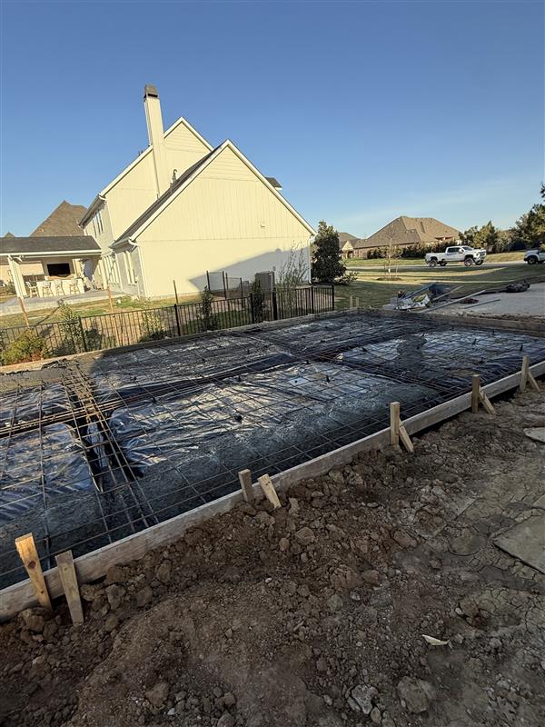 Phase 2 — Forms set and rebar in place for the full slab pour