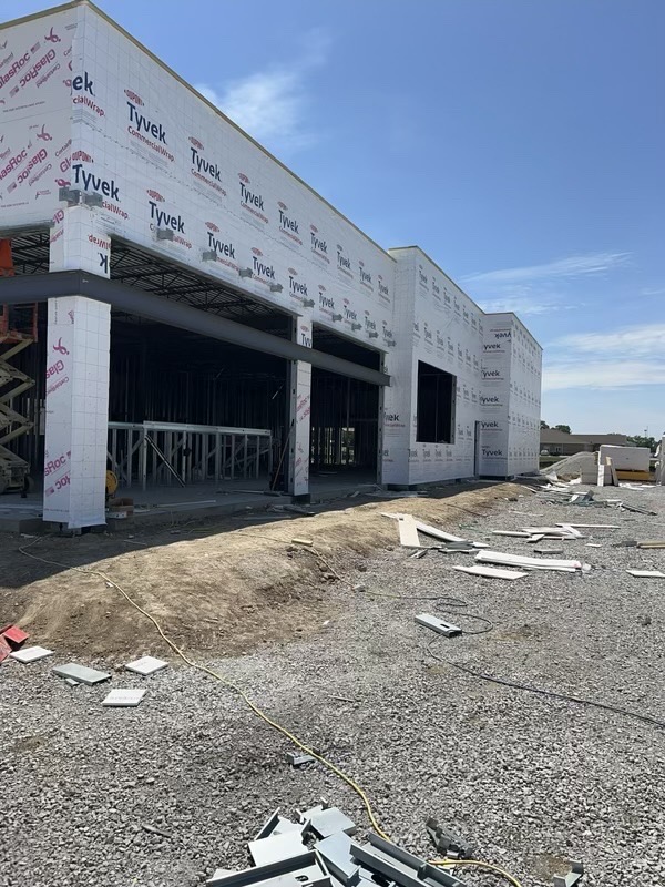 Phase 4 — Second-story light-gauge steel framing over sheathed lower level