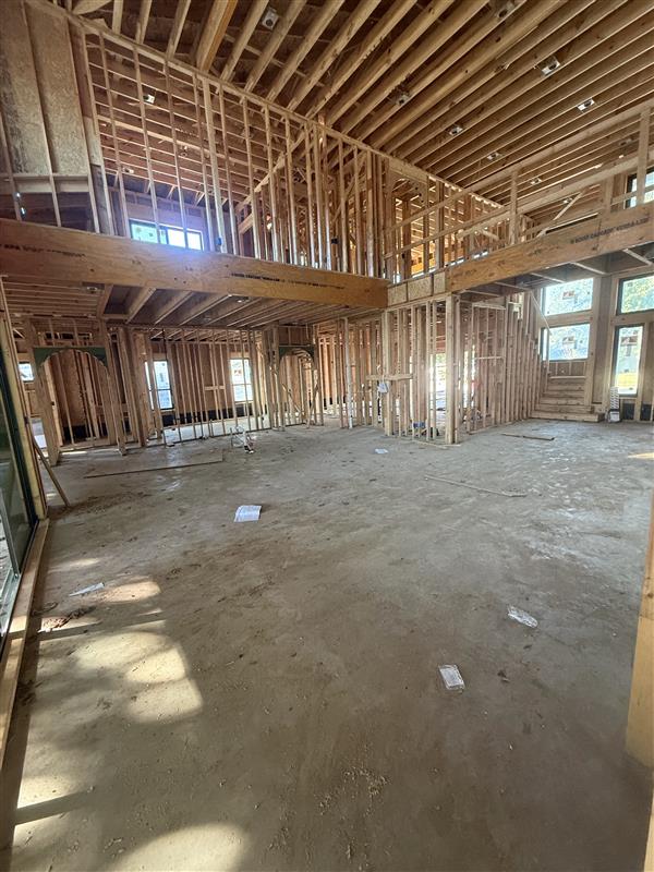 Phase 5 — Two-story great room framing with open loft above