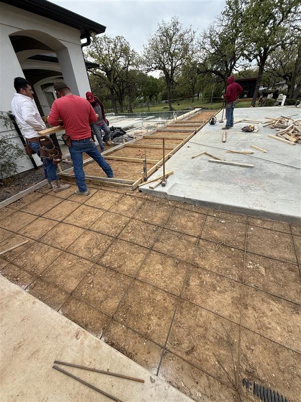 Phase 1 — Rebar grid tied and forms set for expanded poolside patio slab