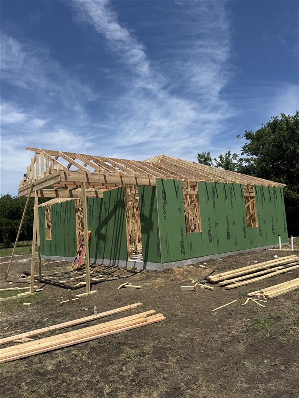 Phase 6 — Roof framing extended across the full elevation